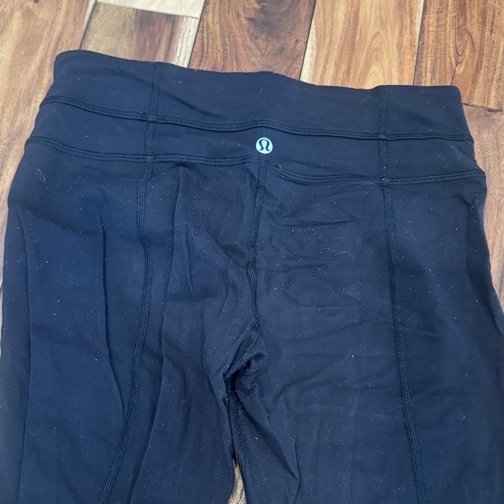 Lululemon straight leg black leggings size 4